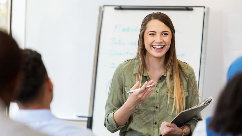Female leader presenting to a team