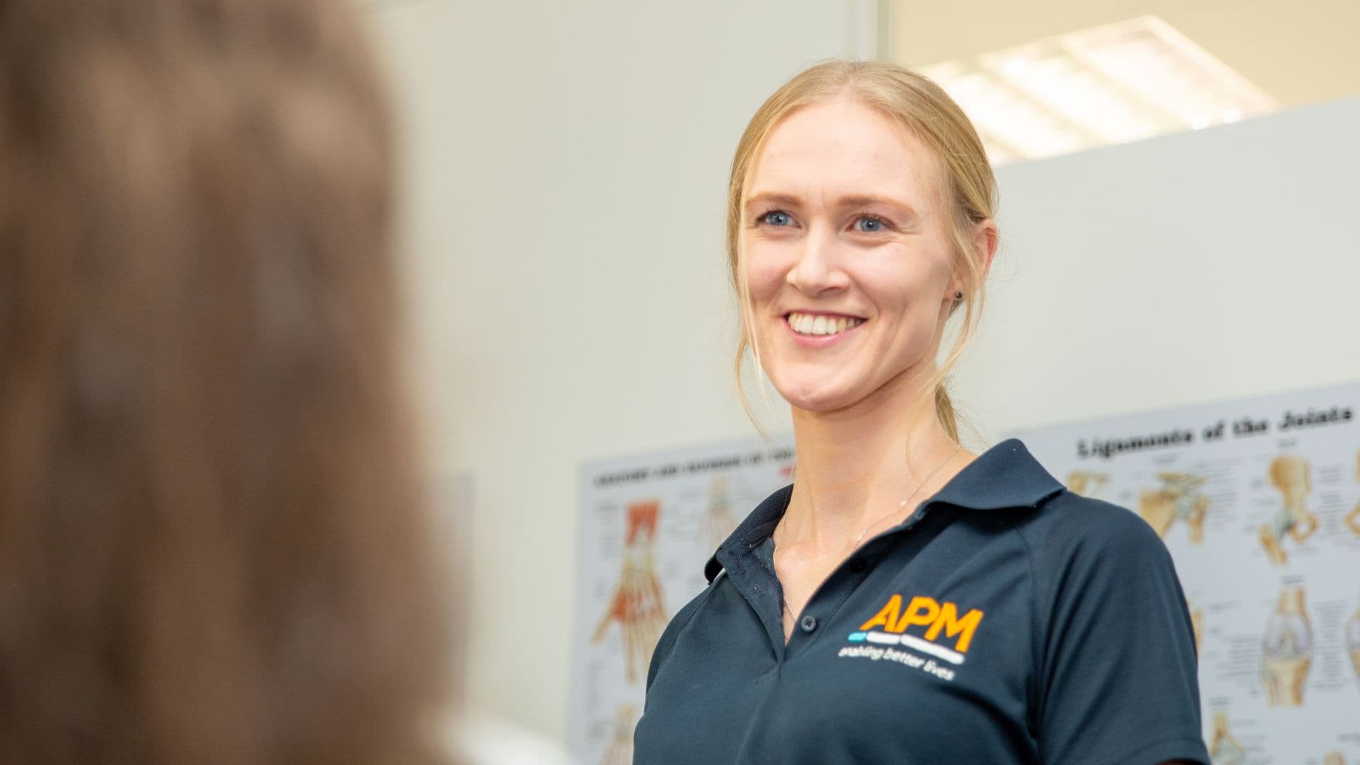 Aimee from APM smiling
