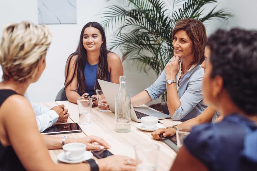 Team of workers having a meeting around a table