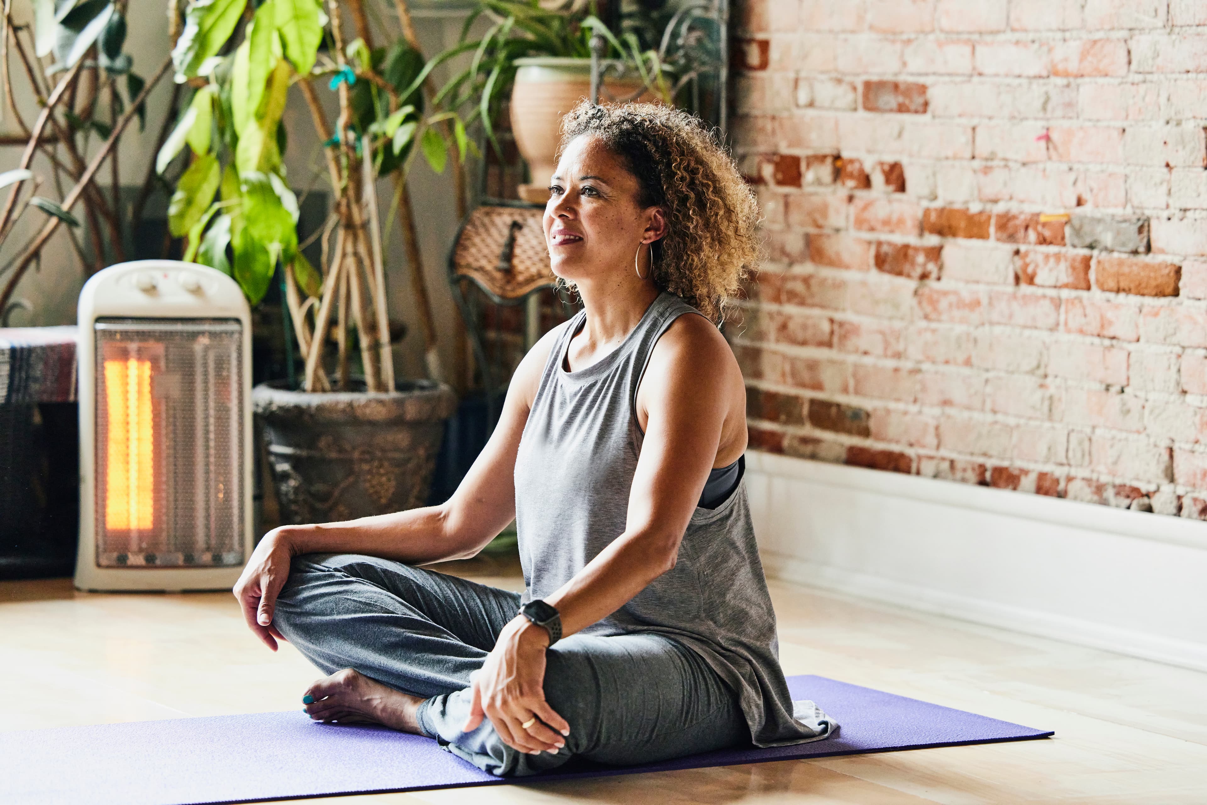 A woman demonstrating physical therapy to counter long covid symptoms